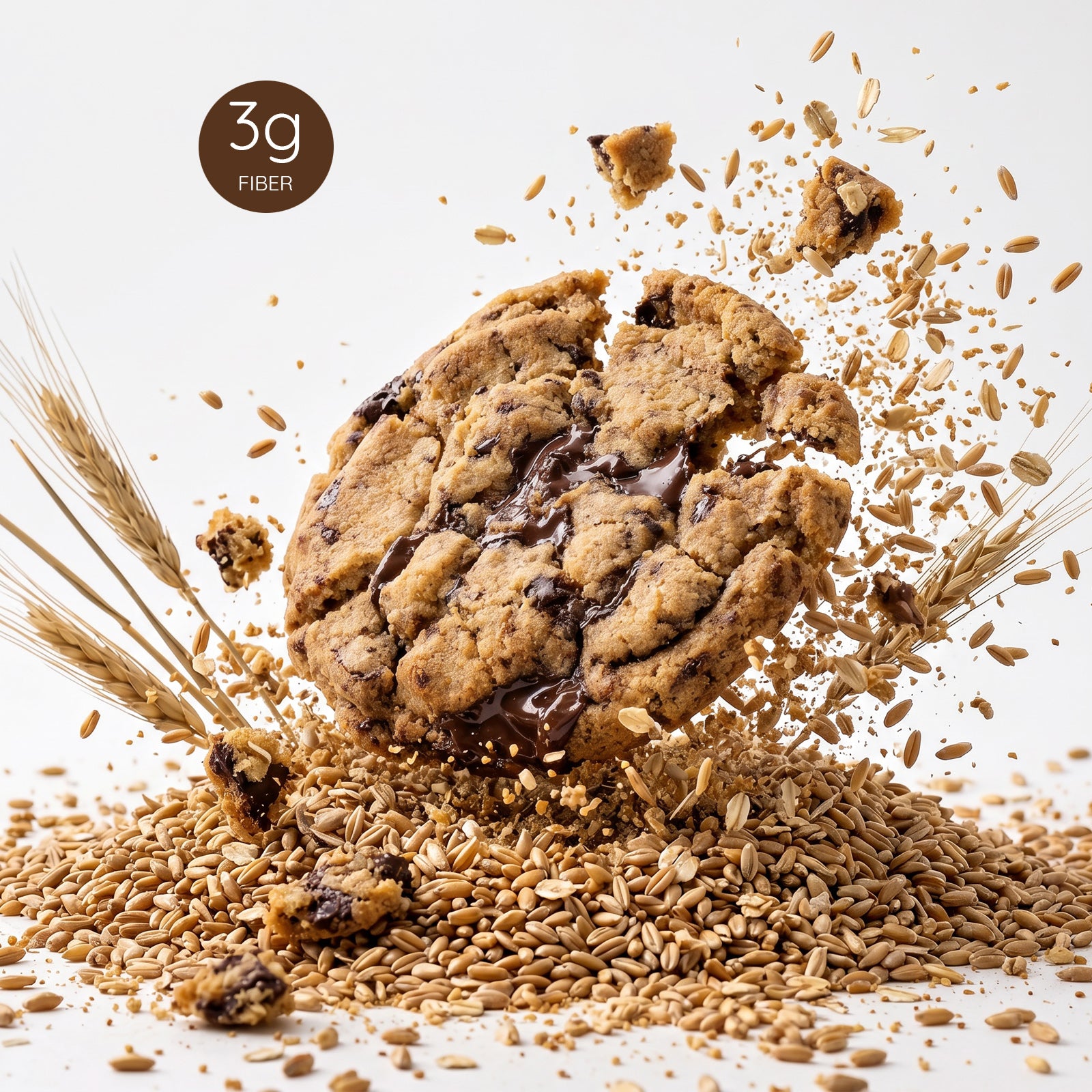 Chocolate chip cookie surrounded by wheat grains on a light background 3 grams of fiber