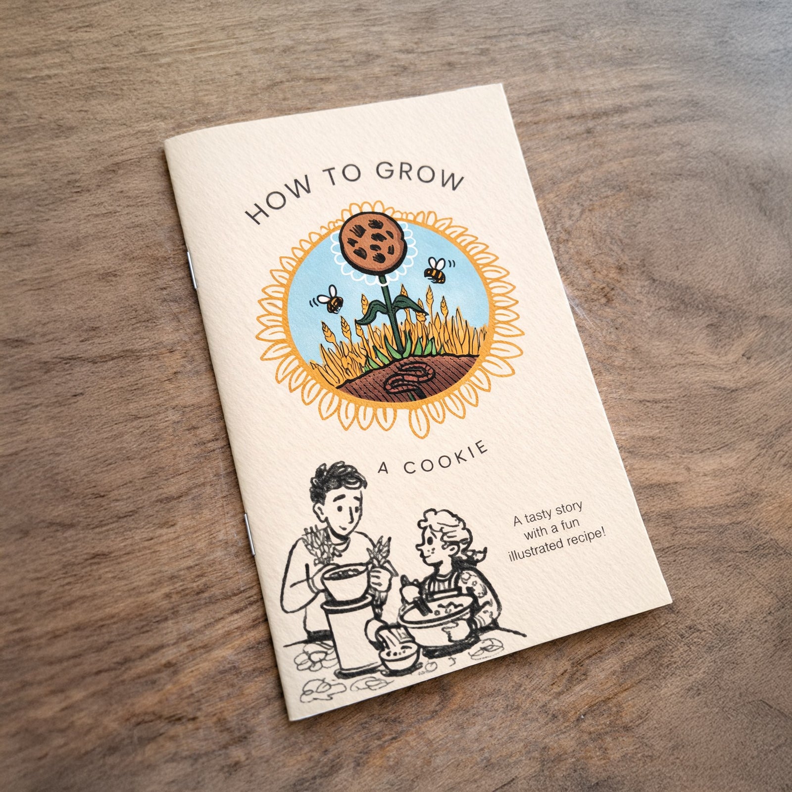 Booklet titled 'How to Grow a Cookie' on a wooden surface